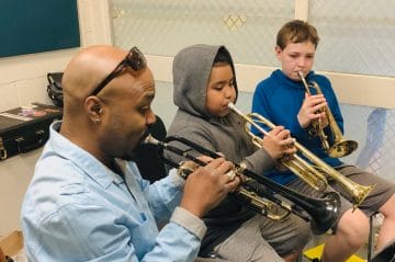 Music Mentors teach trumpet